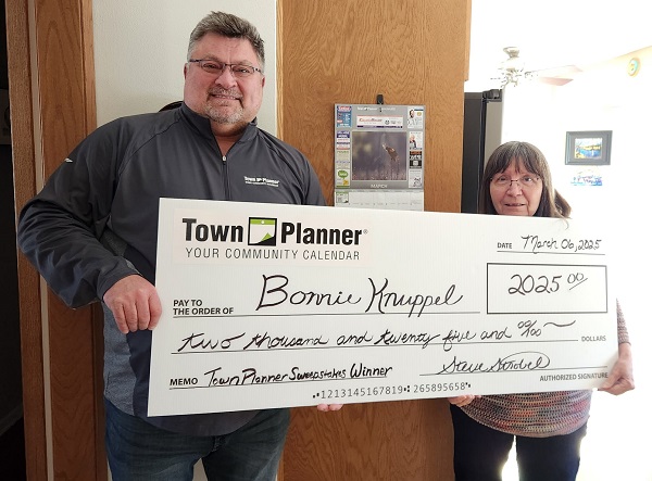 photo of Town Planner Publisher Steve Strobel and our 2025 Winner Bonnie K.