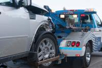 Emerson Towing LLC. Logo