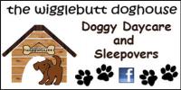 The Wigglebutt Doghouse logo
