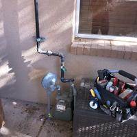 Town & Country Plumbing Heating Cooling LLC Logo