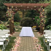 Floral Expressions by Maria & Larry Logo