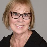 Sheryl Bakewell - RE/MAX Lakes Area Realty Logo