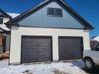 Tim’s Overhead Garage Doors Logo