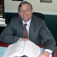 Mikel J. Hoffman Attorney at Law Logo