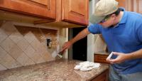 Alpha Kitchen Remodeling Experts Logo