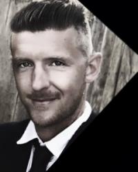 Klaus Nyman - New Buffalo Real Estate Logo