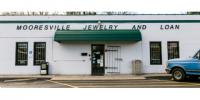 Mooresville Jewelry & Loan Pawn Shop logo