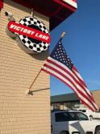 Victory Lane Quick Oil Change - Plano Logo
