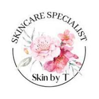 Skin by T Logo