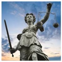 The Vela-Collins Law Firm Logo