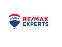 The John Quinn Real Estate Experts Logo