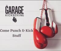The Garage Kickboxing logo