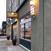 Nomadic Oasis Barber Lounge Logo