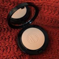 Merle Norman Cosmetic Studio Logo