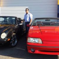 New Ford Wyoming Auto Repair & Collision Logo