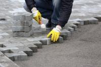 Arvada Paving Logo
