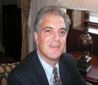 Law Offices of Marshall S. Tauber Logo