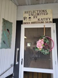 Reflections Unlimited By Kathy Logo