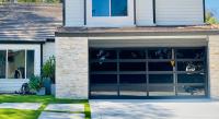 Premier Garage Doors & Gates Inc. Logo