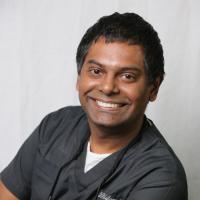 Washington Heights Dentist Arvind Philomin Logo