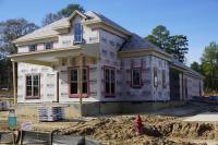 Manns Homes, Inc. Logo