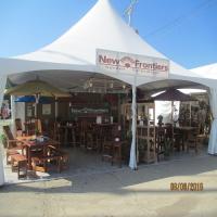 New Frontiers Home & Garden Furnishings Logo