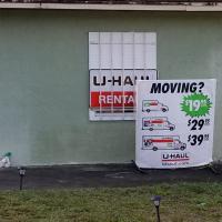 Russell McMillan Inc. & U-haul Logo