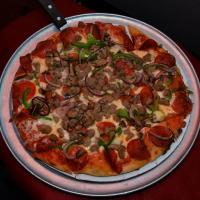 The Whistle Stop Pizzeria & More Logo