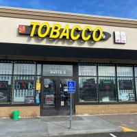 Coon Rapids Tobacco Shop Logo
