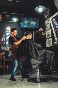 Sports Cuts Barber Shop Logo
