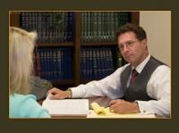 Law Office of John E. Gutbezahl, LLC Logo