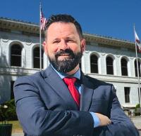 The Law Offices of Dale R. Gomes Logo