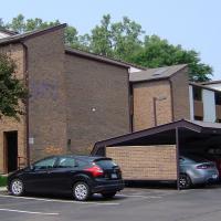 Carriage Hills Manor - Property Management Logo