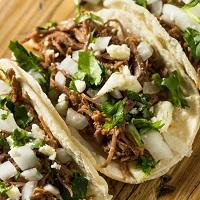 Mariana's Tacos Y Paletas Logo