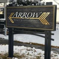 Arrow Realty & Management Logo