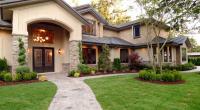 Town and Country Lawn Care Services in Alex Logo