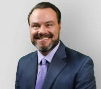 Dr. Johnny Peet MD, FACOG Logo