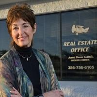 Country Club Properties of Spruce Creek Logo