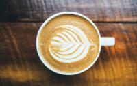 Marq' E Donuts & Coffee Logo
