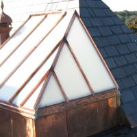 J. L. Goode Roofing & Building Contractors Logo