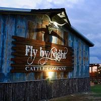 Fly By Night Cattle Company Steakhouse logo