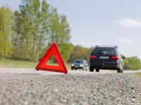 Tik's Quick Towing Company LLC Logo