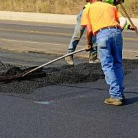 Cavanaugh Paving and Grading Inc Logo
