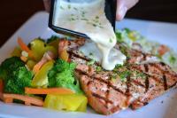 Tommaso's Italian Grill & Cajun Seafood Logo