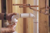 Leupold Plumbing and Heating Logo