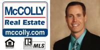 McColly Real Estate logo