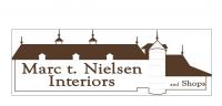 Marc t. Neilsen Interiors logo