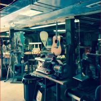 Gunpowder Guitar Repair  Logo