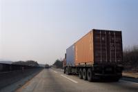 M.N.I Trucking  Logo