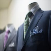 Ezzy's Men's Wear Logo